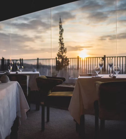 Restaurant Latour dining room during sunset.