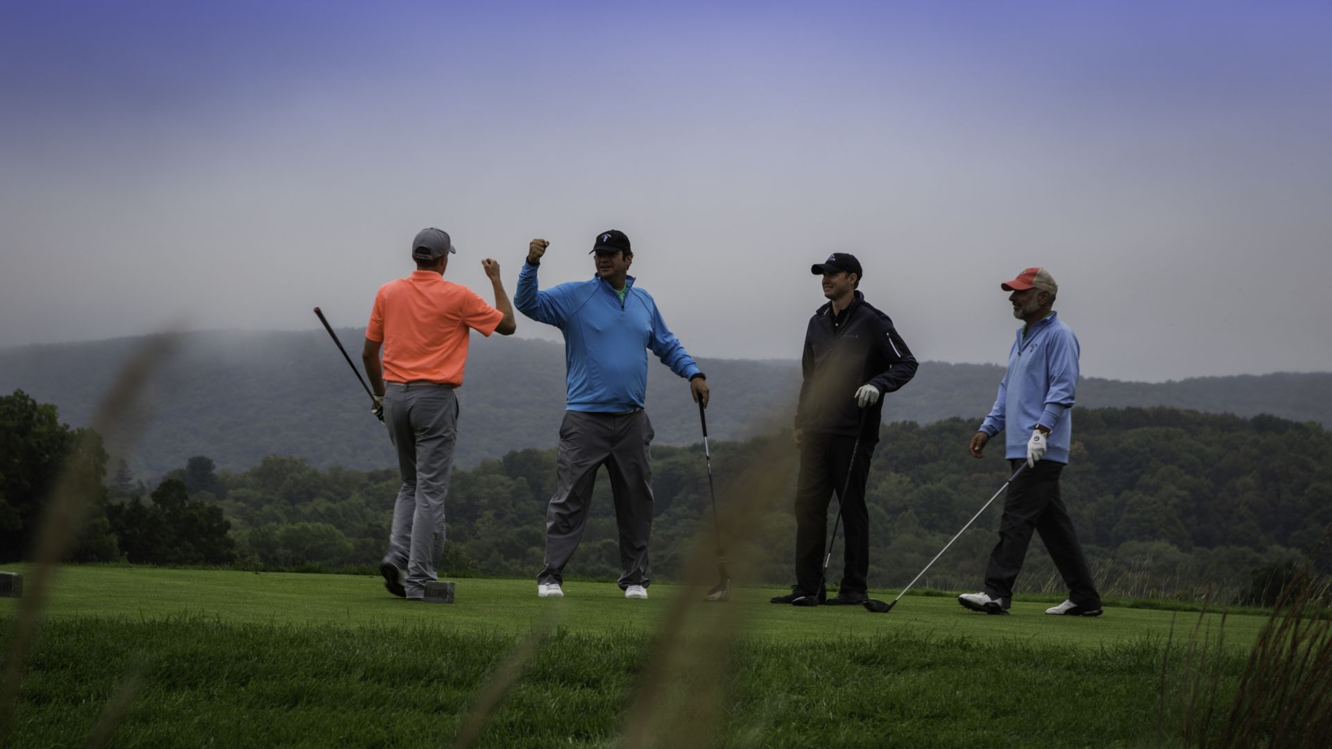 A happy foursome of golfers.