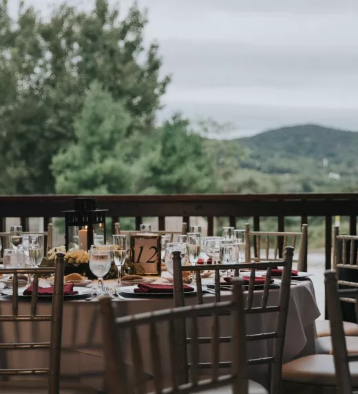 Table set for wedding reception with a mountain view