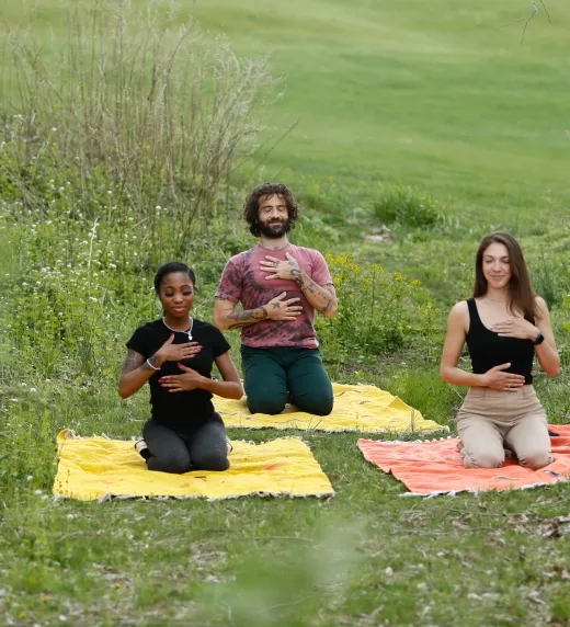 Group of three practicing Yoga in Nature at Crystal Springs Resort
