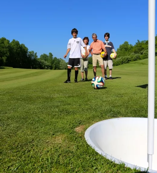 Family playing foot golf at a family friendly resort close to NYC