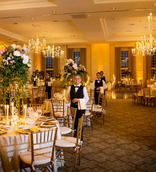 Banquet servers during a wedding in the Emerald Ballroom