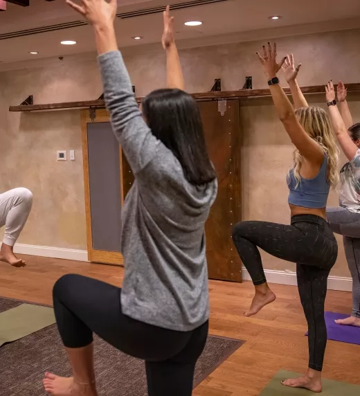 Girlfriends taking part in a yoga class at Crystal Springs Resort
