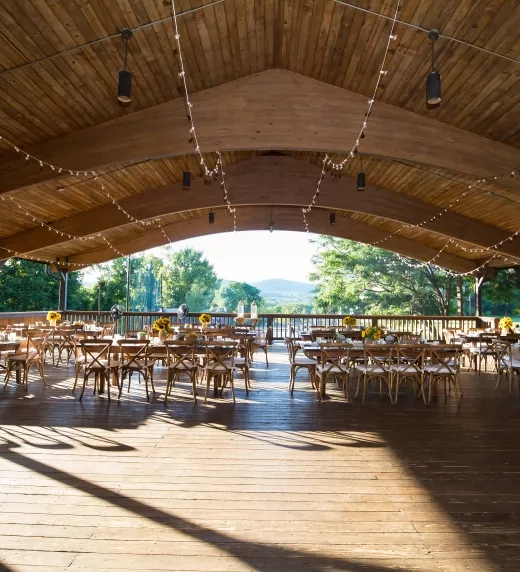 Inside view of Sweetgrass Pavillion with tables and chairs
