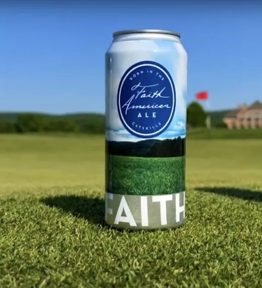 Faith american beer cans on golf course.