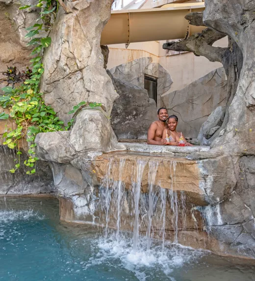 Couple enjoying the jacuzzi at the Biosphere Pool
