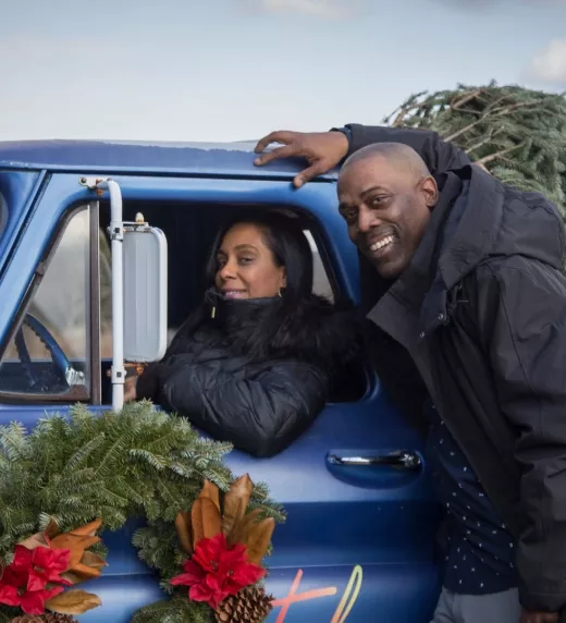 Couple Christmas photo in Crystal Springs Resort blue truck
